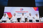 DAP votes to remain in Anwar-led unity government