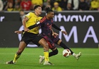 Olise helps Bayern past Dortmund in German Supercup