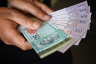 Ringgit opens higher against US Dollar