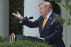 Iran ‘collapsing,’ Trump says amid new US sanctions push