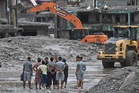 Rescuers dig into tunnel as missing toll from Nepal, China flood nears 3,000