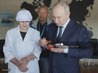 Putin visits Kuril islands claimed by Japan