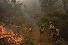 Fire in southwestern Spain active as 470 moved to safety