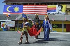 SK Bohor community sews giant Jalur Gemilang to celebrate National Month