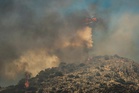 Fires near Greek capital controlled after claiming two lives
