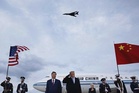 Experts: Trump’s welcome photo with Xi Jinping likely AI-altered