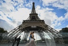 Eiffel Tower reopens after row over removing women staff