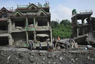 Nepal holds day of mourning as families pray missing still alive