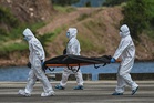 Philippine rescuers pull more victims from charred ferry