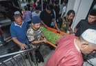 Three family members killed in Tambun fire laid to rest in same grave