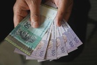 Ringgit edges up amid cautious sentiment, geopolitics