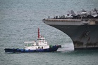 USS Abraham Lincoln seen off Thai port after months at sea
