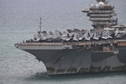 USS Abraham Lincoln docks near Pattaya for rest after 286 days at sea