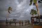 Hurricane Polo sweeps over Mexico’s Pacific coast, heads inland
