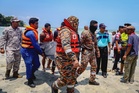 Body of teenager discovered, search for two more in Tanjung Lompat continues