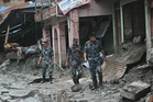 Rescuers pull survivors from debris as death toll mounts in Nepal flood disaster