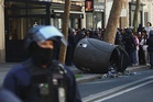 Teenager loses hand picking up grenade in France school protests