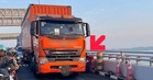 Motorcyclist squeezed between trailer and barrier sparks safety concerns