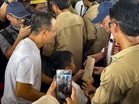 Child hands over letter to Prime Minister