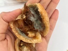 Woman finds green mould inside curry puff bought at market