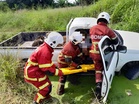 Man killed, woman injured after pickup crashes into drain