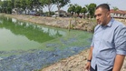 Kolam tadahan bertukar biru, berbau busuk
