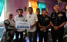Keluarga Konstabel Raimi terima pampasan takaful RM72,500