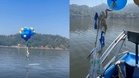 Pemandu bot jumpa belon penuh wang di tasik