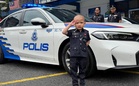 Kanak-kanak hidap leukemia teruja naik kereta polis