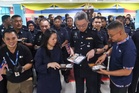 Mahsuri, SEGi College agih bento Hari Malaysia buat polis