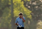 McIlroy falters, shares Masters lead with surging Young after wild third round