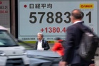 Asian stocks rally, crude drops on lingering hope for peace deal