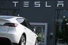 Tesla eyes AI, robot future with US$25b spend as Q1 profits rise