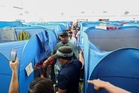 In Sandakan, some fire survivors say being turned away from full relief centres
