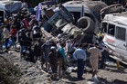 Highway bombing in Colombia kills 14, injures dozens as election violence surges