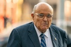 Giuliani recovering from pneumonia, still critical, says spokesman