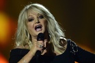 Singer Bonnie Tyler placed in induced coma after emergency surgery for perforated intestine in Portugal