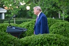 US appeals court temporarily reinstates Trump’s 10pc global tariffs