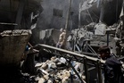 Israel steps up attacks on Gaza since Iran truce, as military says Hamas rearming