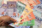 Ringgit closes higher against US dollar, major currencies as expectations mount for Trump-Xi meeting