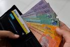 Ringgit closes mostly higher on strong GDP but weaker against US dollar