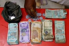 India scrambles to stop rupee slide as oil shock drives currency to record low
