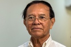 Cambodian king pardons former opposition leader