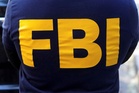 Ex-CIA official arrested after FBI finds US$40m in gold bars at Virginia home