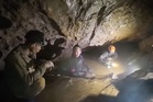 Survivors advise rescuers as risky search begins for last two trapped in Laos cave