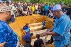 Four family members killed in Johor crash laid to rest in single grave