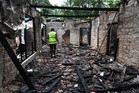 Sri Lanka detains care home manager as investigators find more bodies, lifting fire toll to 12