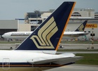 Singapore Airlines in talks with Airbus and Boeing to buy at least 50 long-haul jets, say sources