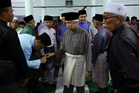 Tuanku Muhriz performs Friday prayers at Masjid Kariah Gunung Pasir in Seri Menanti