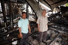 Grandfather rescues family of nine as fire razes decades-old Sibu house